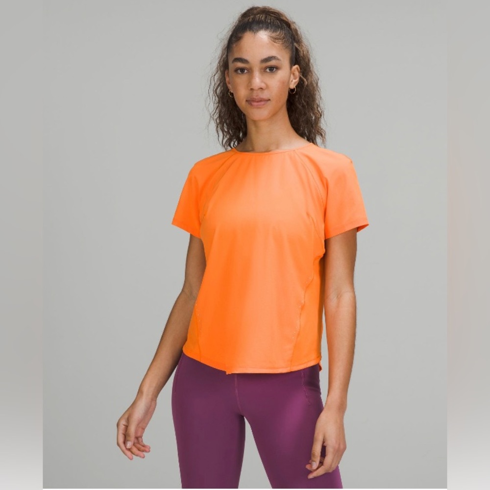 Orange Lululemon top, worn once, perfect condition